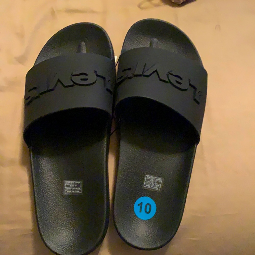 Never worn men’s bath slippers